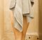 woman with bath towel with tips on simple hygiene